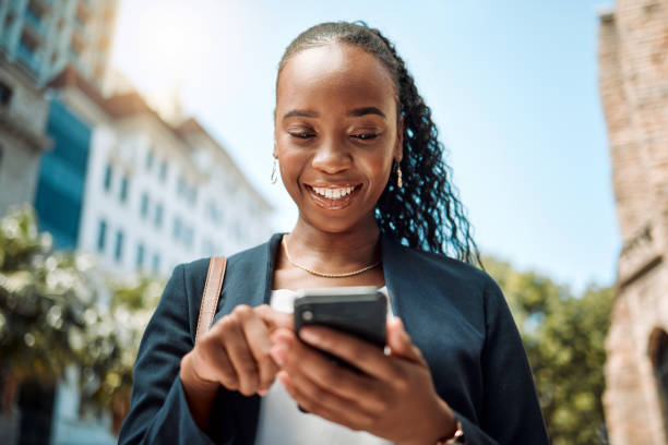 Professional reviewing SMS on her phone